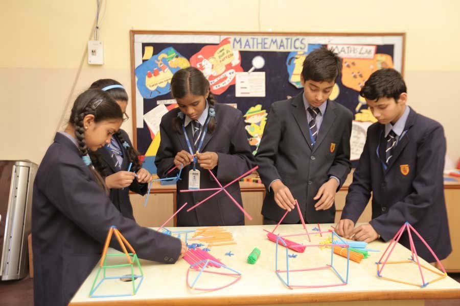 Students using math learning materials